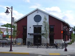 A picture containing sky, outdoor, building, road

Description automatically generated